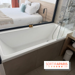 La baignoire ouverte sur la chambre